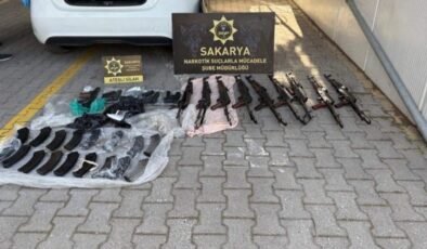 Polis memuru silah sevkiyatında yakalandı