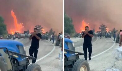 Alevlerin ortasında tepki çeken görüntüler! Orman kül olurken, o sigara yaktı