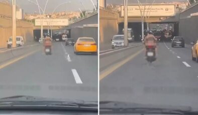 Motosikletin arkasında, iç çamaşırıyla seyahat etti
