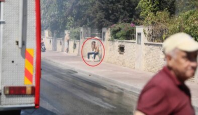 Evini ateşe verdi, yarı çıplak halde karşısına geçip seyretti