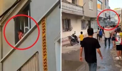 Yangında nefes kesen anlar! Önce çocuğunu attı, ardından kendisi atladı